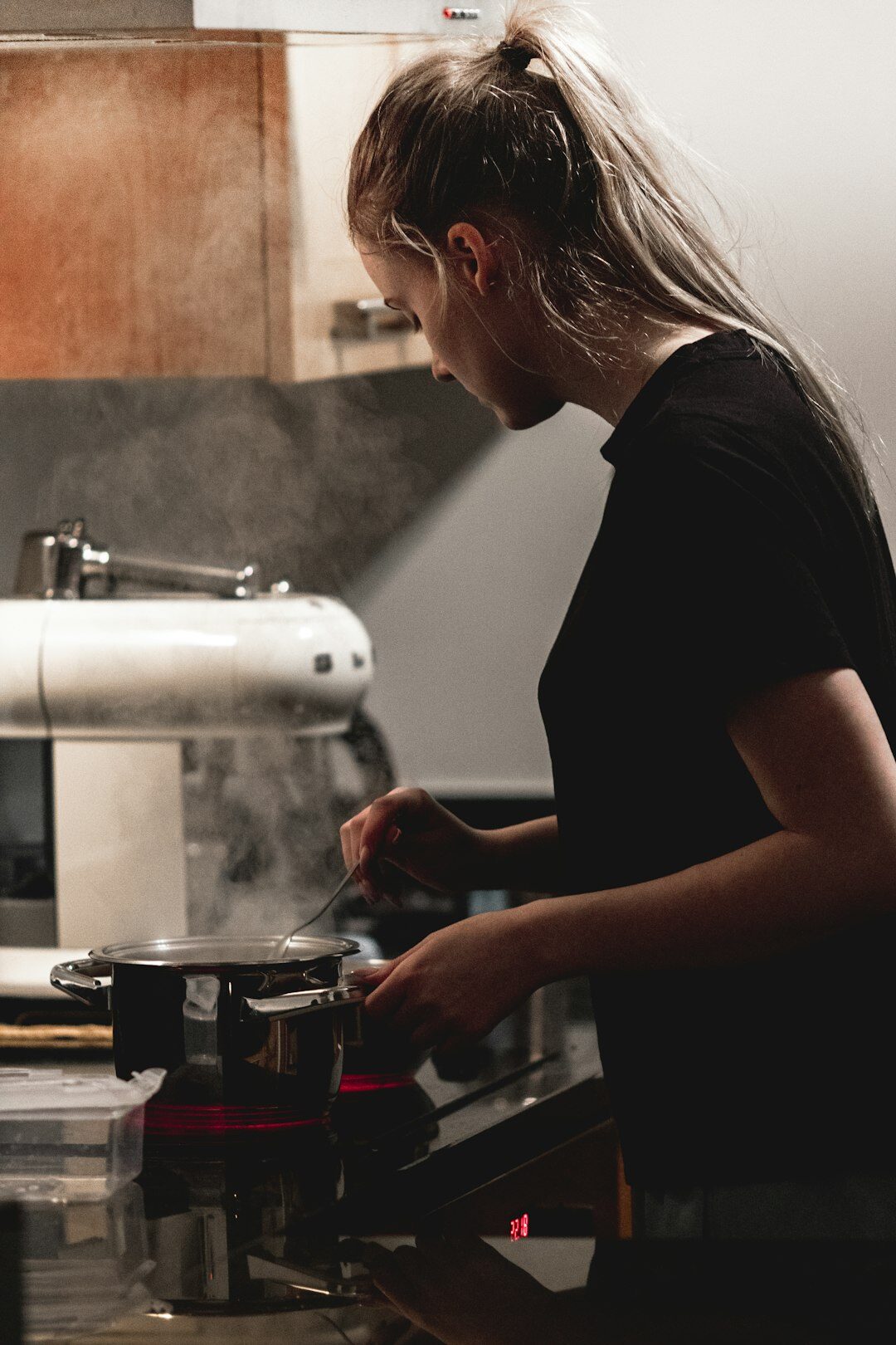 woman cleaning kitchen
